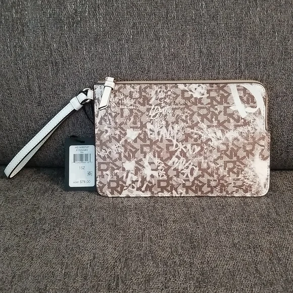 Nwt DKNY medium brown graffiti wristlet. Retails $78 - Picture 2 of 8